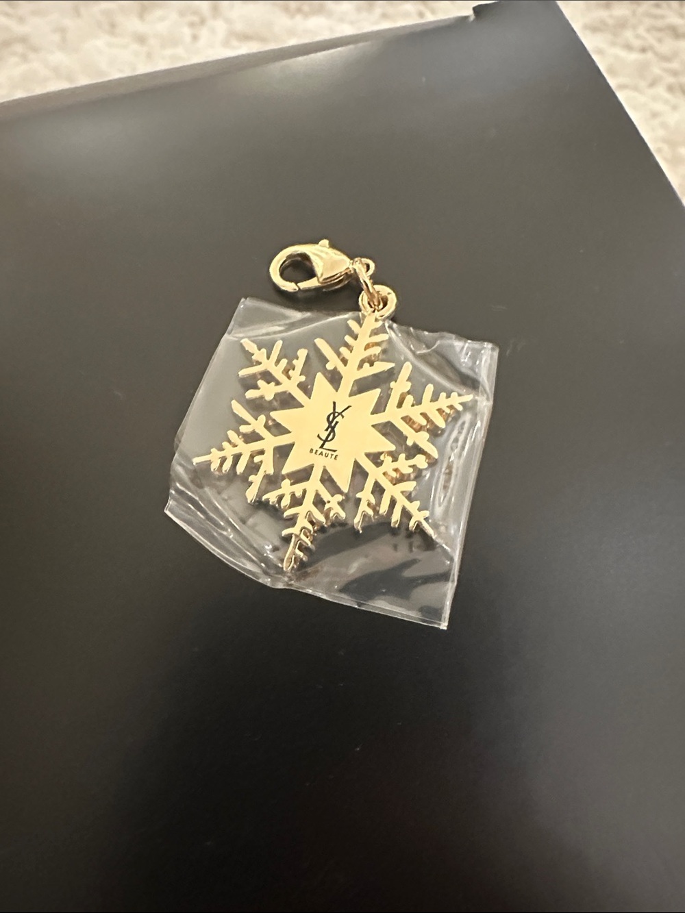Yves Saint Laurent beauty Gold Snowflake Key Charm